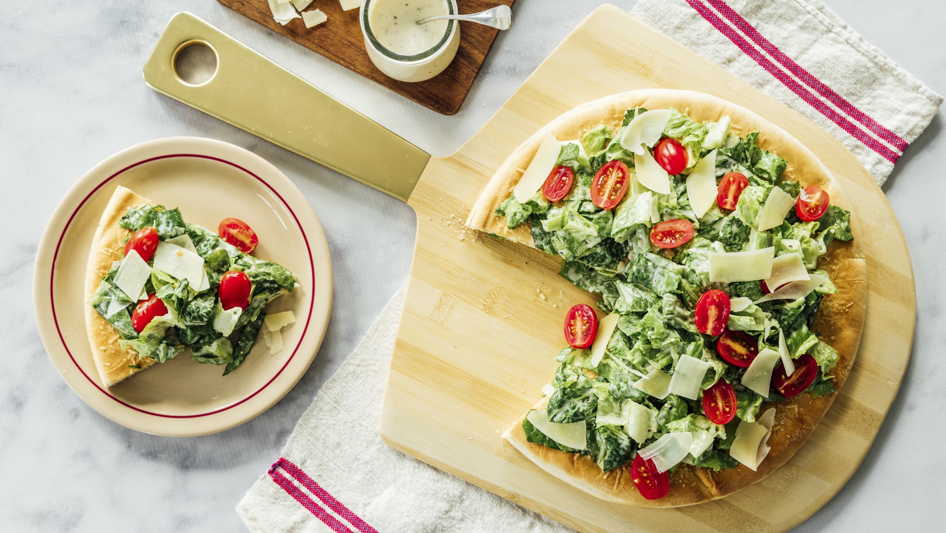 Chopped Caesar Salad on Cheese Pizzaa Crust HeroA