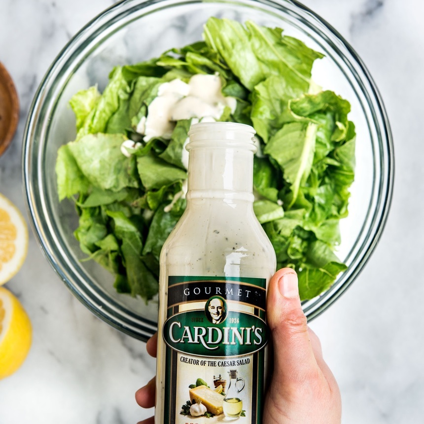 add dressing to lettuce