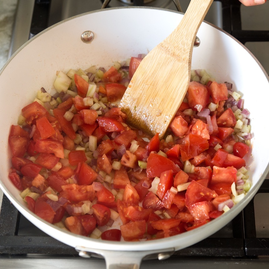 add tomatoes to pan