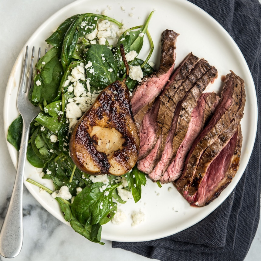 balsamic flank steak served with salad