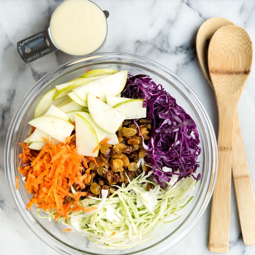 combine cabbage carrots apples