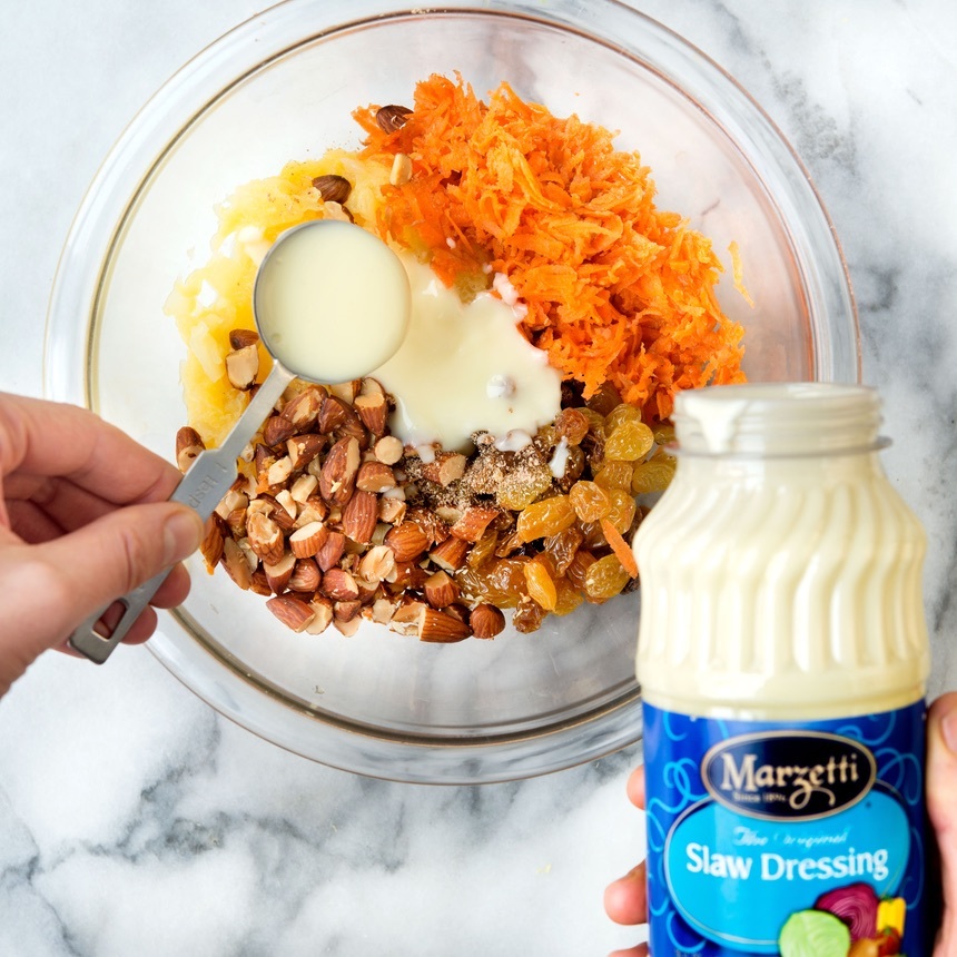 combine carrots with dressing