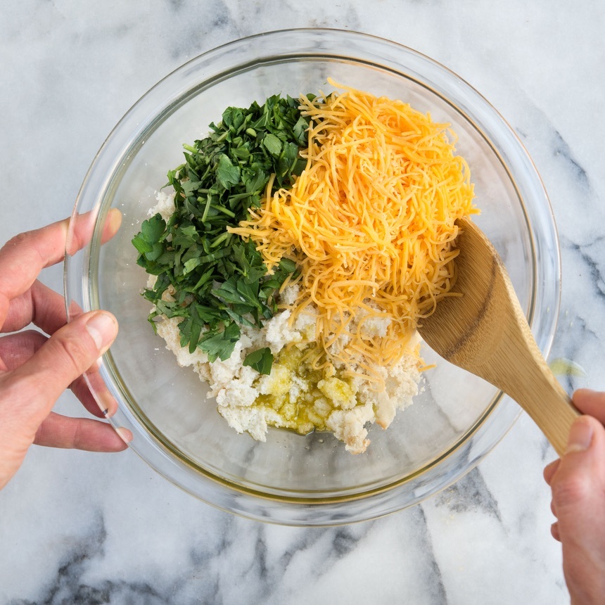 combine roll pieces and cheese