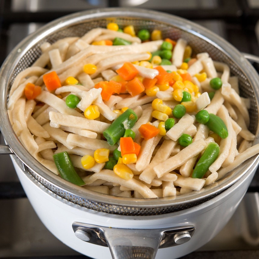 cook noodles and vegetables