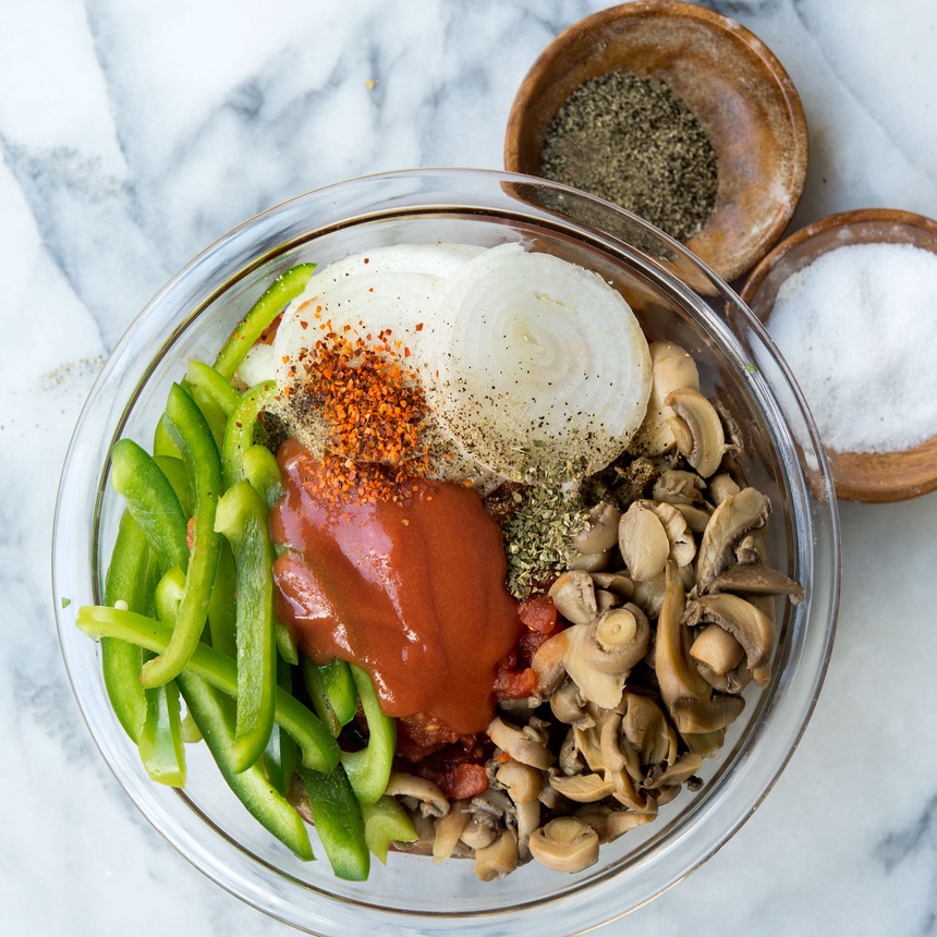 mushrooms onions peppers in bowl