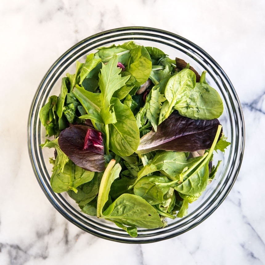 place greens in bowl
