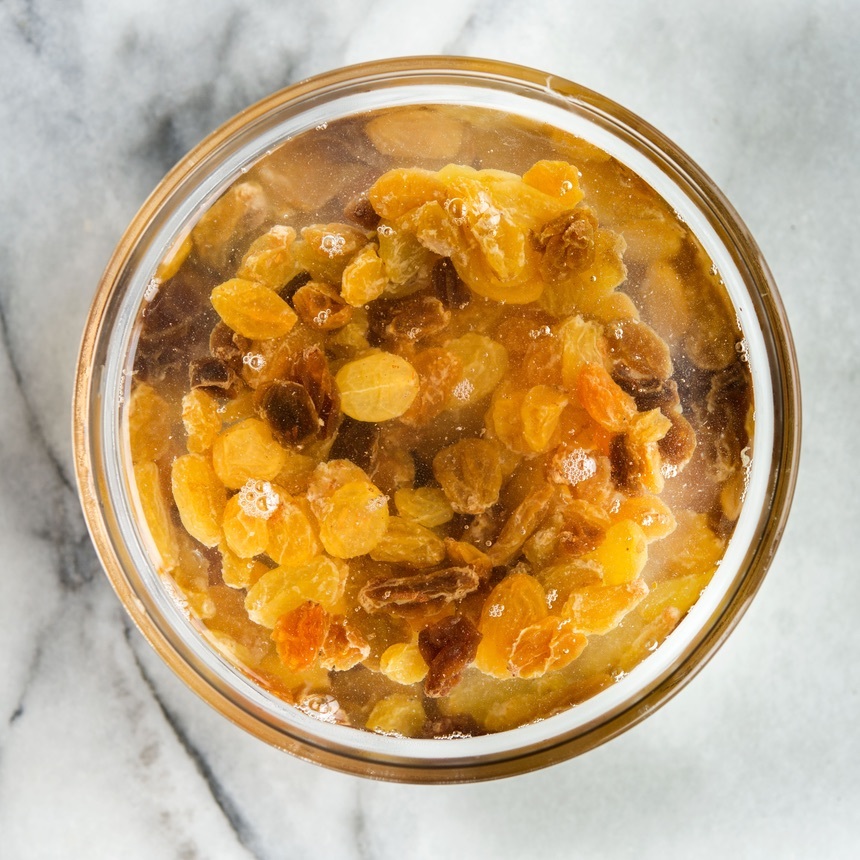 place raisins in bowl