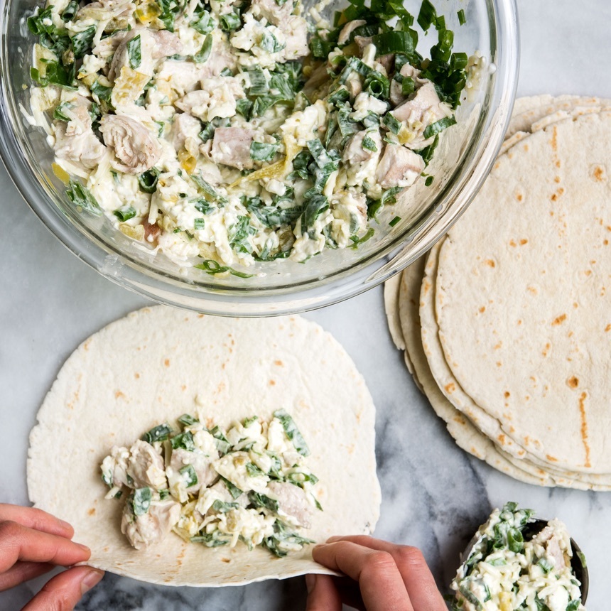 spoon mixture in tortilla