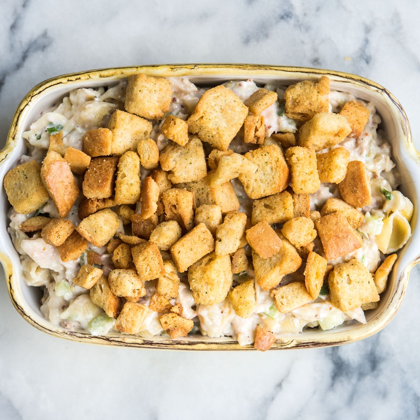 sprinkle croutons onto tuna