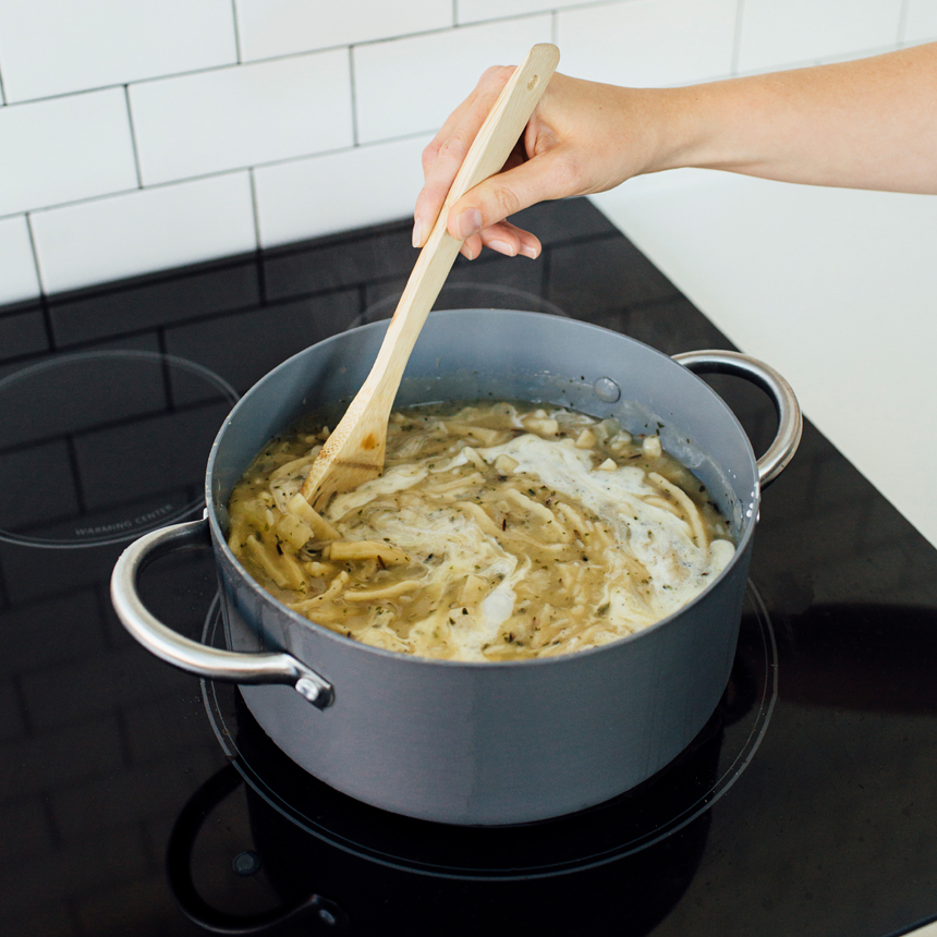 step4 add broth mixture to cooked rice and noodles
