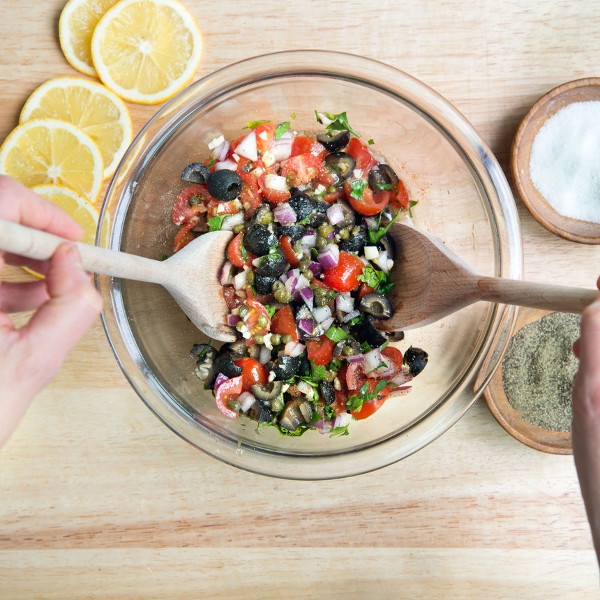 combine tomatoes and capers