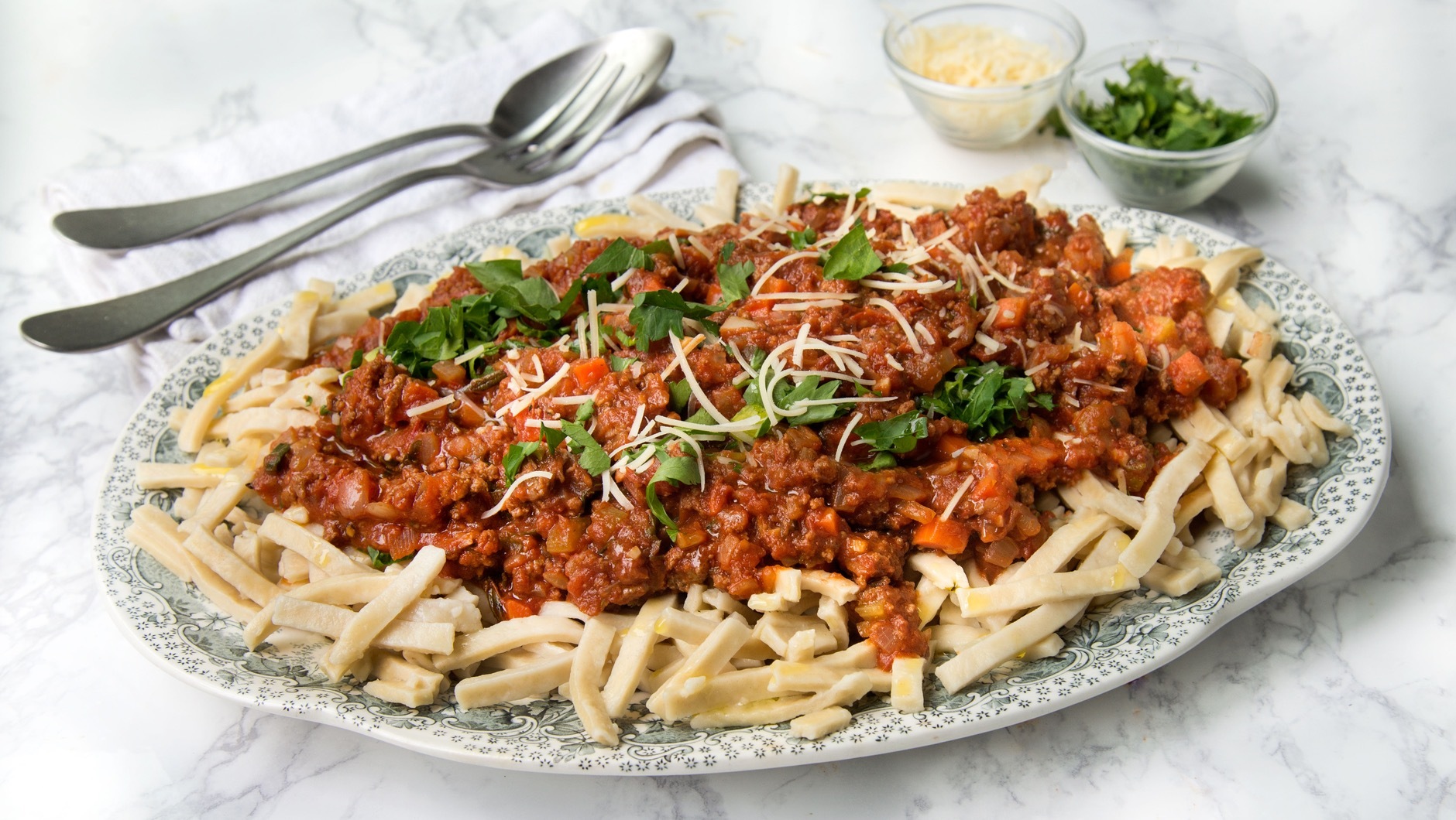 ragu over egg noodles