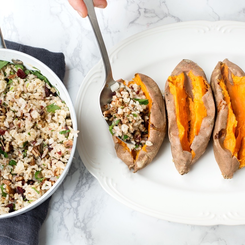 spoon rice in potatoes
