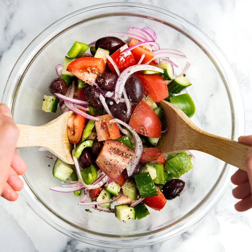 combine cucumbers in bowl